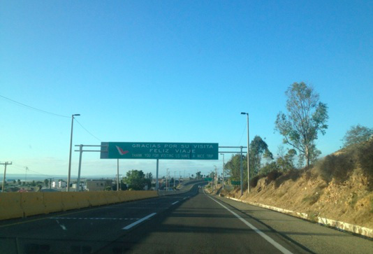 1. Heading north on the toll road, you will go through the last toll booth. Playas de Tijuana will be on your left. Continue on this road for a few miles.