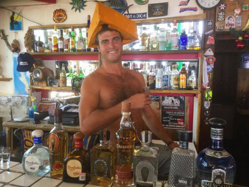 Nathan serves up fun at the bar at Playa BuenaAdventura